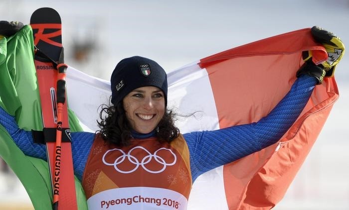 epa06527245 Bronze medal winner Federica Brignone of Italy celebrates during the venue ceremony for the Women's Giant Slalom race at the Yongpyong Alpine Centre during the PyeongChang 2018 Olympic Games, South Korea, 15 February 2018. EPA/DANIEL KOPATSCH